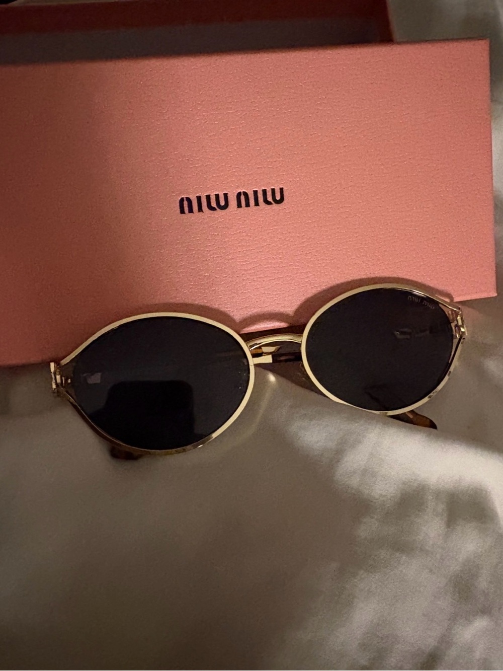 Miu Miu Gold Frame Black Lens Oval Sunglasses with Tortoiseshell Arms